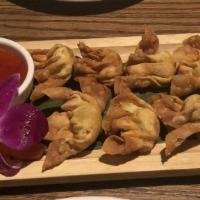 Fried Wontons (8 Pieces) · fried grounded meat & corn wrapped in wonton skin served with spicy plum sauce.