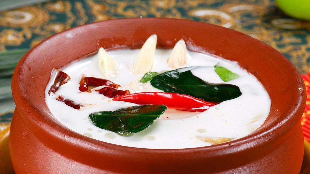 Tom Kha Gai · spicy. chicken soup with galangal, lemon grass, mushrooms, bell pepper, coconut milk in lime juice.