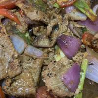 Fried Beef On Hot Iron Plate · beef, bell pepper, onion, black pepper sauce.