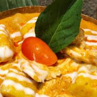 Malay Curry Chicken · Spicy.  chicken, potato, onion, coconut milk in yellow curry.