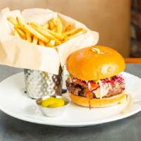 House Burger · Natural angus beef, applewood bacon, maple smoked cheddar, caramelized onions and served wit...