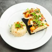 Fish Tacos · Tempura battered Boston cod, upland cress, chili ancho cream, ranchero salsa and served with...