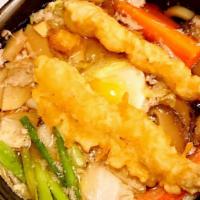 Nabeyaki Udon · Shrimp, tempura, chicken vegetable and egg with soup.