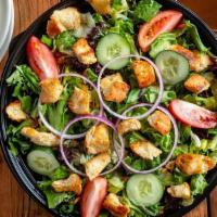Family Size House Salad · Diced cucumbers and tomatoes, red onions, cheddar cheese, croutons.