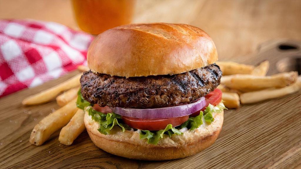 The Uno Burger · A half-pound burger grilled to your liking and topped with housemade garlic mayo, lettuce, tomato, and red onion on a toasted bun.