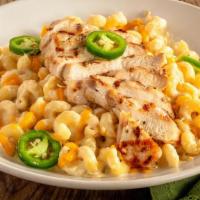 Rattlesnake Pasta · Sliced grilled chicken breast over cavatappi in spicy asiago cream sauce, topped with chedda...