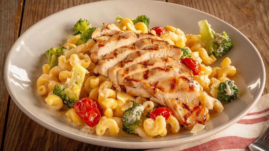 Chicken & Broccoli Alfredo · Sliced grilled chicken breast and broccoli over cavatappi in asiago cream sauce, topped with parmesan and seasoned cherry tomatoes.