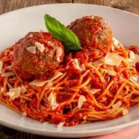 Classic Spaghetti & Meatballs · Italian style meatballs made with beef, pork, romano, and ricotta, over thin spaghetti in ou...