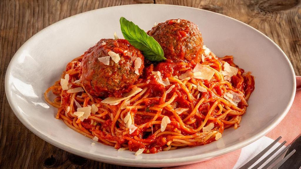 Classic Spaghetti & Meatballs · Italian style meatballs made with beef, pork, romano, and ricotta, over thin spaghetti in our traditional housemade marinara. Topped with parmesan and fresh basil.