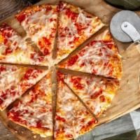 Vegan Cheese Pizza · Daiya® vegan mozzarella cheese and housemade pizza sauce on our thin crust dough.