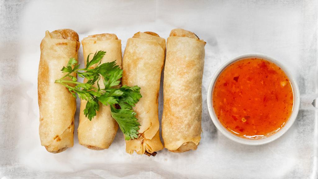 Spring Rolls · Fried veggie rolls served with sweet chili sauce.