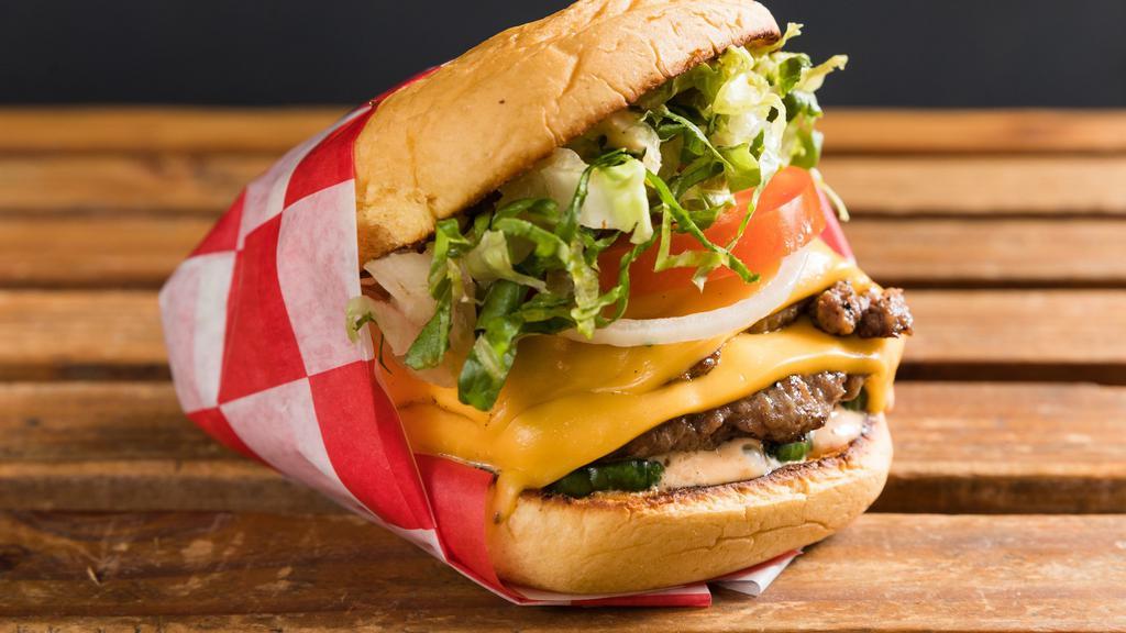 Pop'S Burger · 2 beef patties, cheese, special sauce, pickles, lettuce, tomato, onion.