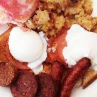 Irish Breakfast · Served with home fries, two eggs, Irish bacon and sausage, fried tomato, black and white pud...
