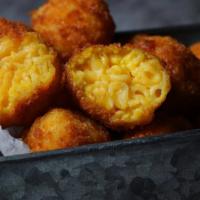 Mac N' Cheese Bites · Baked bite size macaroni pasta in a cheese sauce.