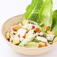 Caesar Salad · Fresh green salad mixed with romaine lettuce, parmesan cheese, croutons, and caesar dressing.