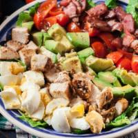 Chef Salad · Fresh salad mixed with garden greens, Roast beef, turkey, ham, boiled egg, and American & Sw...