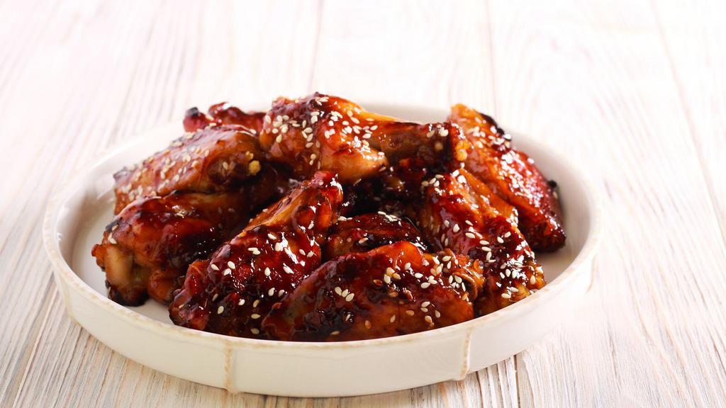 The Teriyaki Wings · Chicken wings fried to golden perfection, topped with Teriyaki sauce.