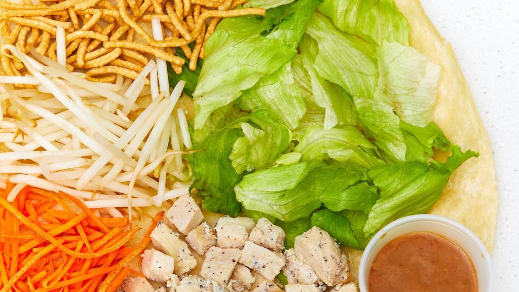 Thai Lettuce · Iceberg, Grilled Chicken, Carrots, Bean Sprouts, Rice Noodles and Thai Peanut Dressing