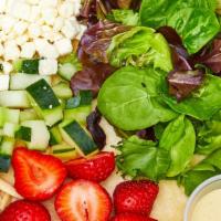 Strawberry Fields · Spinach, Mesculin, Feta Cheese, Strawberries, Almonds, Cucumbers, Sunflower Seeds & Asian Cu...