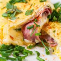 Ham Omelette · Delicious Ham Omelette made with three eggs and ham, prepared to customer's preference. Serv...