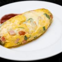 Onion Omelette · Delicious Onion Omelette made with three eggs, topped with onions, and prepared to customer'...