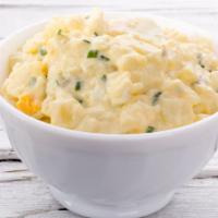 Potato Salad · A half pound side dish of potato salad prepared with mayonnaise.
