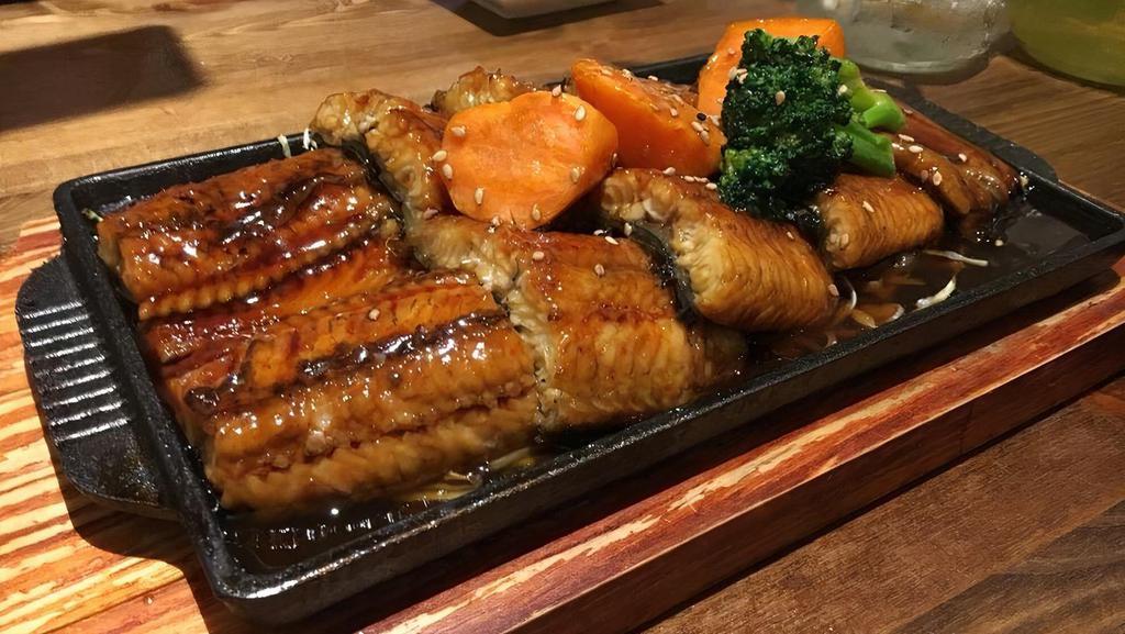 Eel Teriyaki · Broiled eel with teriyaki sauce.