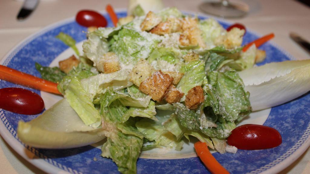 Caesar Salad · Garlic croutons on top of this classic are wonderful, as is the anchovy-infused creamy dressing.