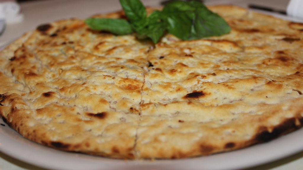 Focaccia Tartufata · Filled with fresh robiola cheese and truffle oil.
