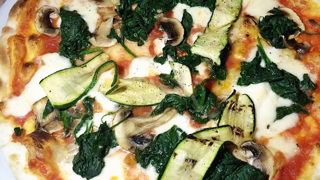Pizza Vegetariana · Vegetarian. Spinach, mushroom, zucchini, garlic, tomato sauce and mozzarella.