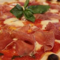 Pizza Di Parma · Imported Italian prosciutto, tomato sauce and mozzarella.