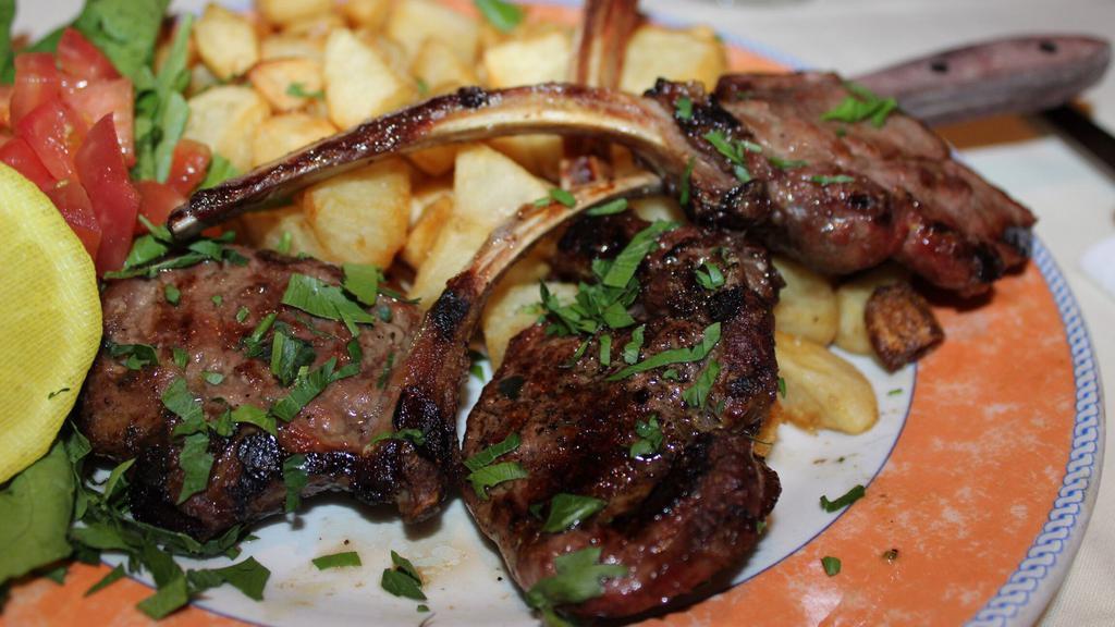 Scottadito Di Agnello Alla Griglia · The finest Australian grilled rack of lamb, served with roasted potatoes.