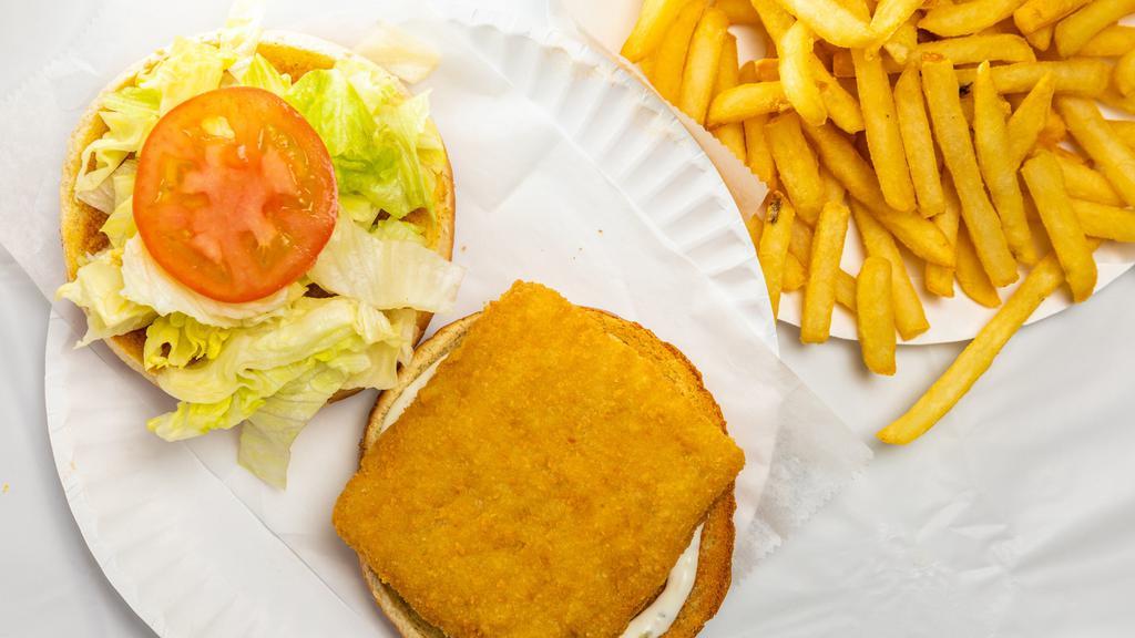 Fish Sandwich · Served with lettuce, tomato and tartar sauce.
