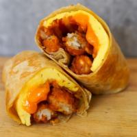 Bacon, Egg And Cheddar Burrito · 3 fresh cracked cage-free scrambled eggs, melted Cheddar cheese, smokey bacon, crispy potato...