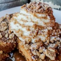 Cinnamon Toast Crunch · Cinnamon toast crunch-coated french toast layered with cream cheese frosting, cinnamon - bro...