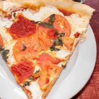 Margarita Pizza · Fresh mozzarella, basil, fresh mozzarella and tomato sauce.