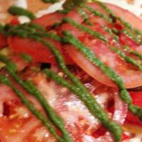 The Italiano Crepe · Mozzarella, tomato, walnut pesto, spinach, chicken or roasted red peppers.