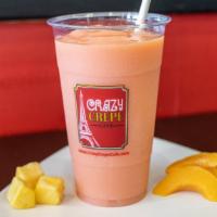 Mango Sunrise · Passion mango juice, mango, peaches, pineapple & raspberry sherbet.