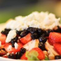 Berry Salad · Spring greens, walnuts, goat cheese, cranberries, strawberries, blueberries, raspberry dress...