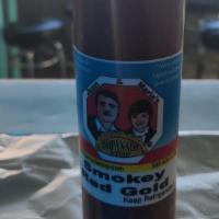 Smokey Red Gold Sauce (8 Oz.) · Our own homemade, Spanish red hot sauce with a Smokey twist. Includes select Spanish herbs a...