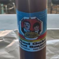 Red Gold Sauce (8 Oz.) · Our own homemade, Spanish red hot sauce with select Spanish herbs and spices. Comes in a squ...