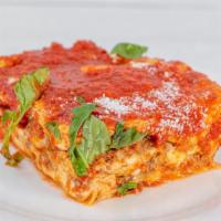 Meat Lasagna · Layered dish with wide flat pasta.