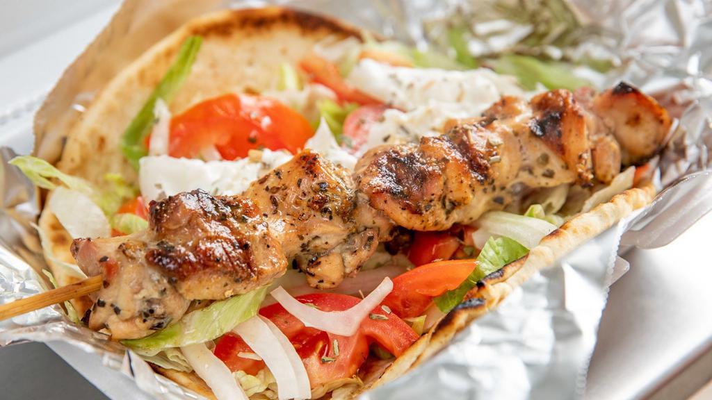 Chicken Souvlaki Platter · with french fries or rice, side salad and pita