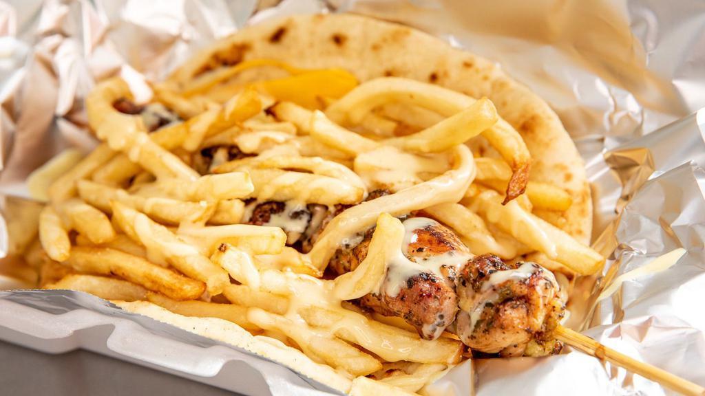New York · Your choice of souvlaki, French fries, American cheese, honey mustard. Choose one: pork or chicken.