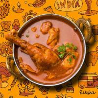Railway Chicken Curry · Tender morsels of chicken cooked in a classic brown curry with Indian whole spices, served w...