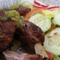 Rib Eye Steak · Cebolla y jalapeños.