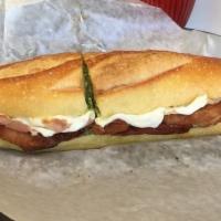 The Tommy Casale · Chicken cutlets, fresh mozzarella, Prosciutto, sun-dried tomatoes, and pesto.