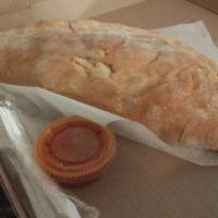 Just Cheese Calzone · Made with ricotta cheese and mozzarella.