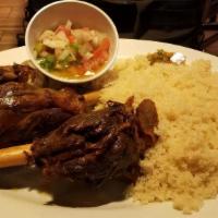 Gigot · Lamb shank served with red and green peppers, tomatoes, and onions with a dijon vinaigrette ...
