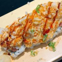 Sr22. Captain America Roll · Spicy tuna crunch topped with crunch kani salad and special sauce.